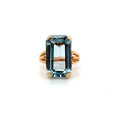 Yellow gold and blue zirconium ring