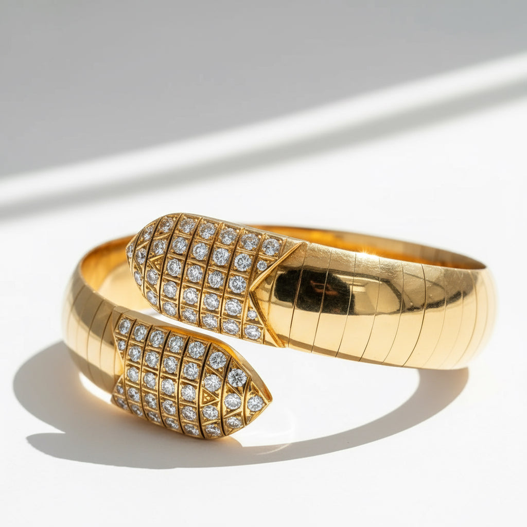 CHAUMET - Bracelet Or jaune et Diamants - Modèle « Plume »