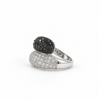 White gold ring with white and black diamonds