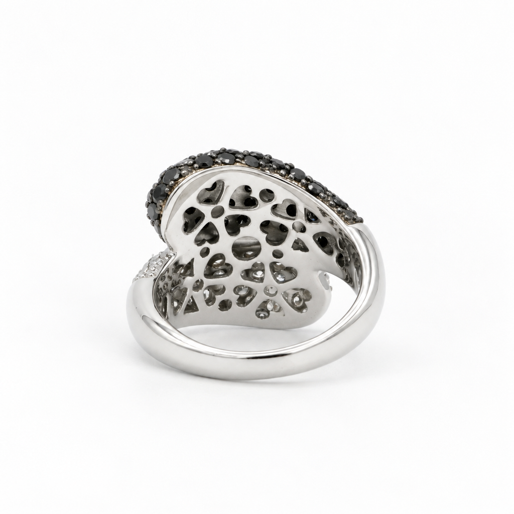 White gold ring with white and black diamonds
