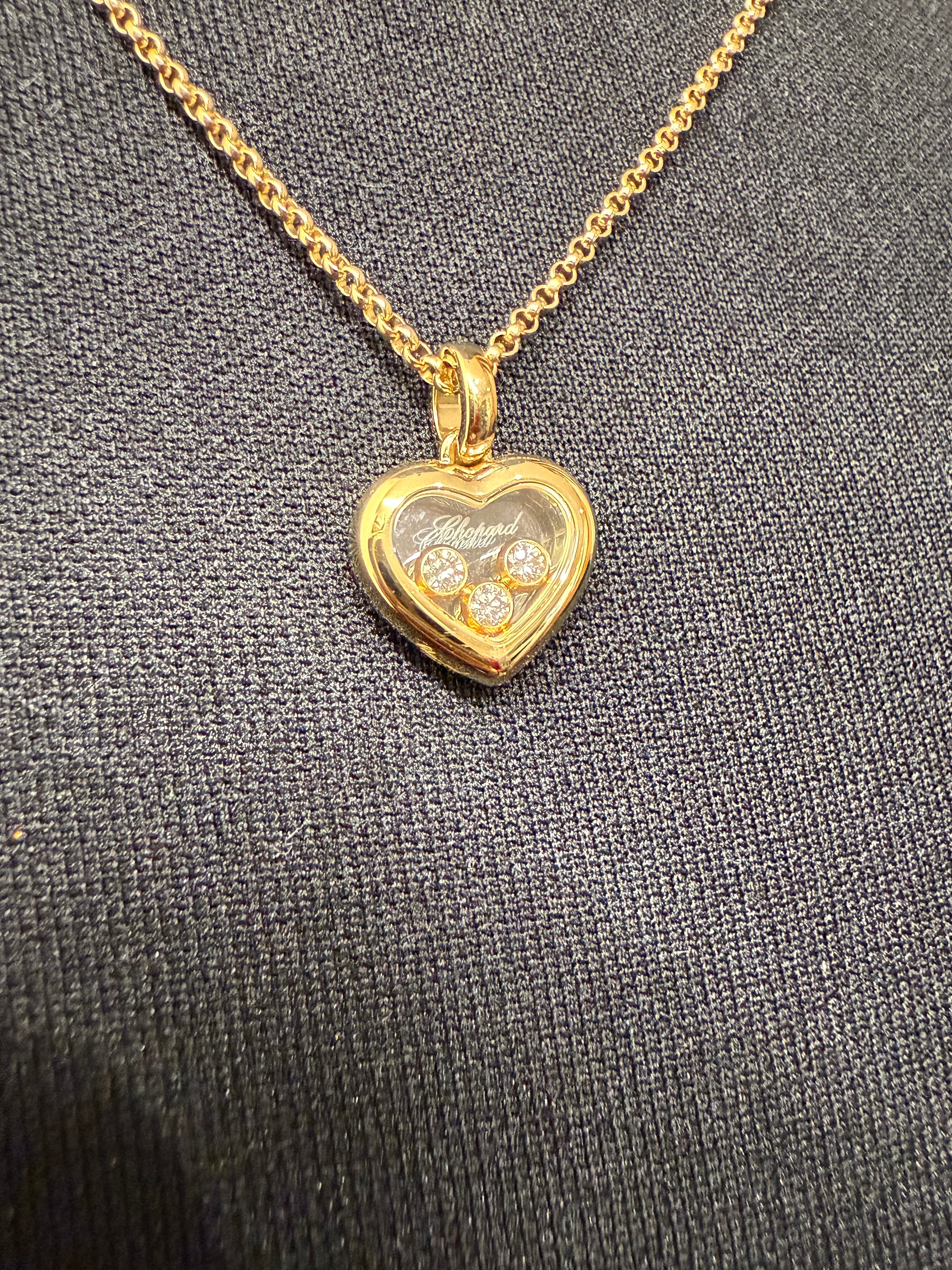 Chopard - “Happy DIAMONDS” yellow gold pendant necklace