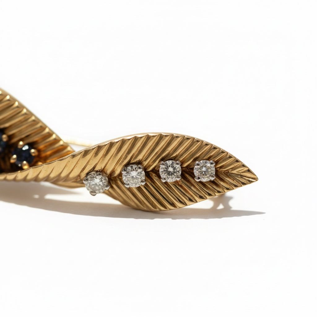 Van Cleef & Arpels - Broche Feuille - Or jaune et Platine - Saphirs et Diamants