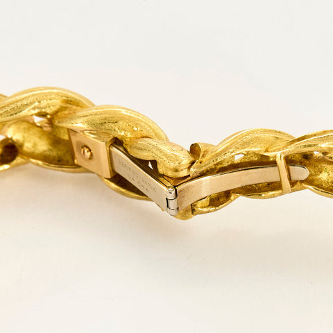 HERMES - Bracelet jonc en or jaune a motif de cheval