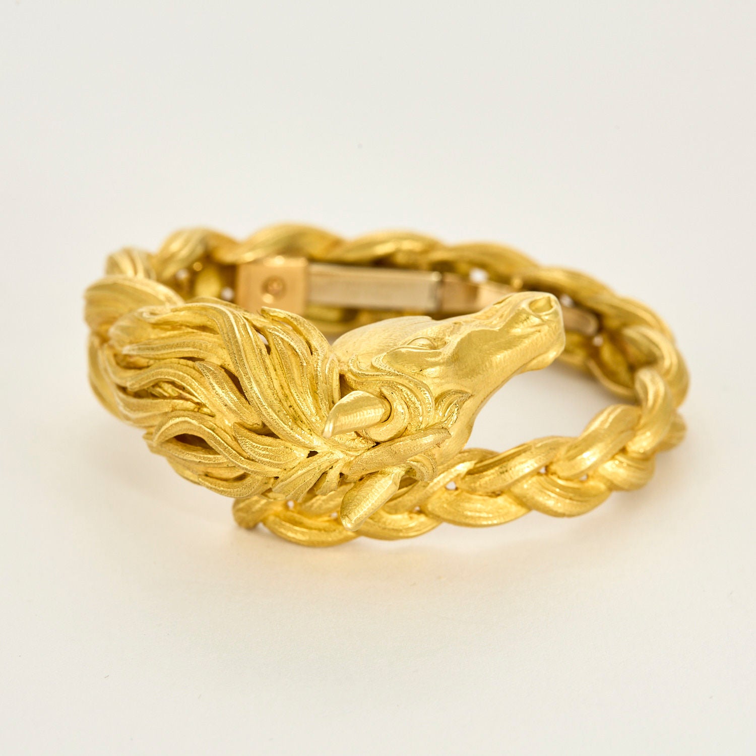 HERMES - Bracelet jonc en or jaune a motif de cheval